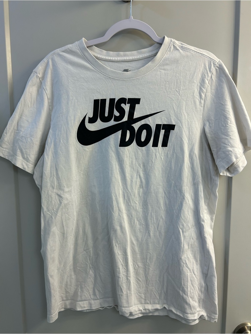 Nike White Short Sleeve Tee with Black 'Just Do It' Swoosh
